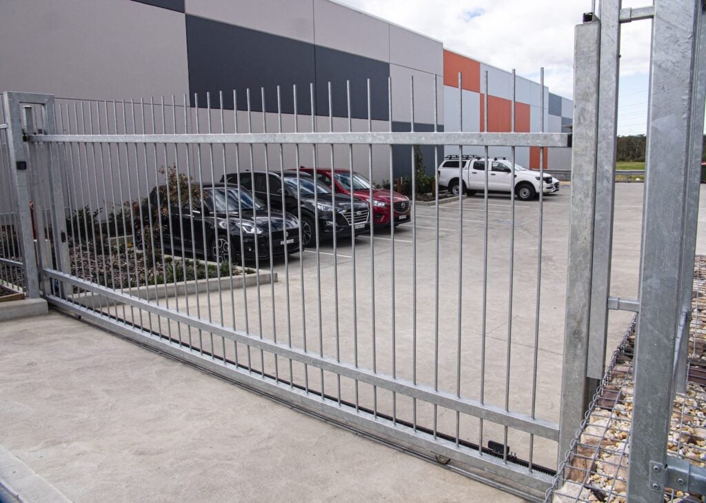 Galvanised steel sliding gate by Chainwire Fencing Specialist at Beresfield business car park